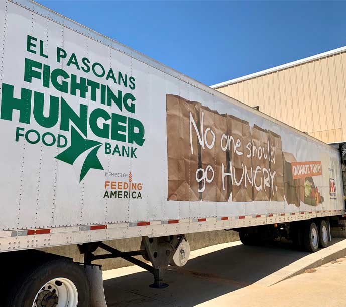 Image of an El Paso Food Bank truck, working in coordination with Breedlove Foods to provide food to those in need.