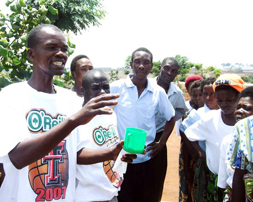 Group of People in Africa Wearing Lubbock T-Shirts.